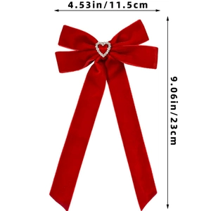 Detailed size measurement of red velvet bow hair clip with a heart rhinestone ornament