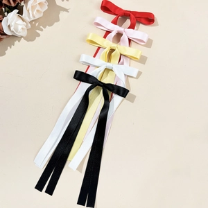 Ensemble de cinq pinces à cheveux nœuds en satin style ballerine aux tons élégants