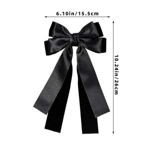 Detail view of large black double-layered bow hair clip with ribbons and dimensions