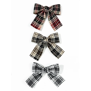 Three-piece British style plaid bow hair clips set in classic red, brown, and grey patterns