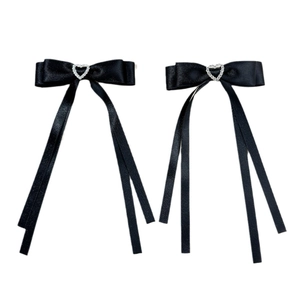 Pair of black satin ballet bow hair clips with heart rhinestones and long ribbon streamers