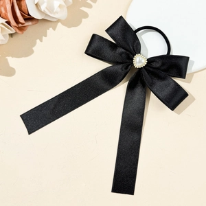 Elegant black satin bow hair tie with a large pearl heart and flexible elastic band