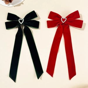 Velvet bow hair clips with hollow heart rhinestones in red and green set of two