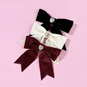 Three-piece set of velvet bow hair clips with heart rhinestone in black, white, and wine red