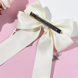 Gothic cream satin bow hair clip with silver cross chain and metal duckbill clip