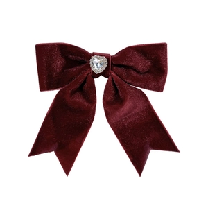 Elegant burgundy velvet bow hair clip with a sparkling rhinestone heart centerpiece
