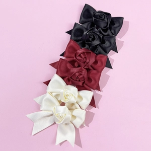 6-piece set of elegant satin rose bow hair clips in black, burgundy, and off-white colors