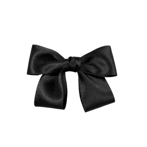 Elegant black satin bow hair clip with glossy silk texture for French minimalist style