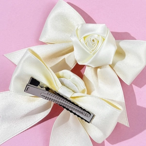 Elegant ballet style cream satin ribbon bow hair clips with delicate fabric rose flower