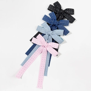 Set mit vier Schleifen-Haarspangen mit gewelltem Rand in Rosa, Blau und Schwarz mit Glitzer
