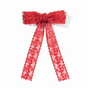 Fiocco per capelli in pizzo rosso vibrante con lunghi nastri per stile dolce
