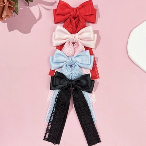 Set di fermagli per capelli con fiocco in pizzo e nastri lunghi in rosso, rosa e blu