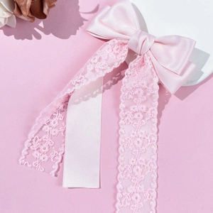 Elegante fermaglio per capelli in pizzo rosa con lunghi nastri di raso da donna