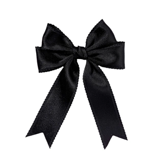 Elegant black silk satin bow hair clip with lace edge ribbons in minimalist style