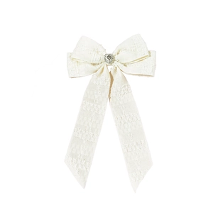Elegant cream white woven bow hair clip with a sparkling heart shaped rhinestone center