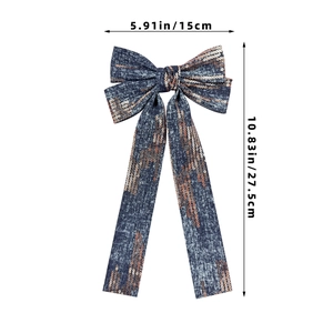 Blue denim bow hair clip with rose gold sequins showing size 15cm width and 27.5cm length