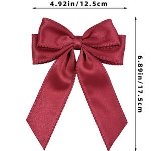 Size specifications of the wine red satin bow hair clip with measurements in inches and cm