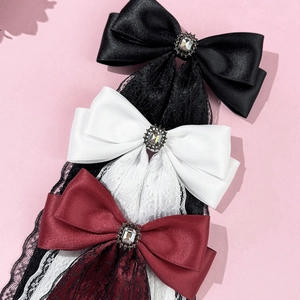 Elegant lace bow hair clips in black, white, and wine red with vintage crystal centers