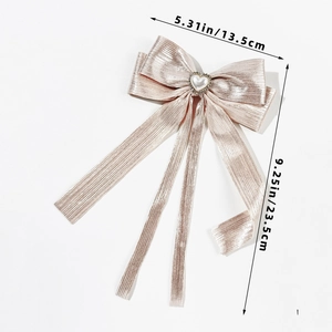 Fermaglio per capelli a fiocco rosa con perla a cuore, strass e nappe, lungo 23,5 cm