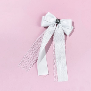 Elegant white lace bow hair clip with black gemstone and long satin ribbon streamers