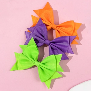 Set di tre fermagli per capelli con fiocco in nastro grosgrain dai colori vivaci per bimba