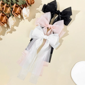 Dreiteiliges Set Tüll-Haarspangen mit langen Bändern in Schwarz, Rosa und Weiß