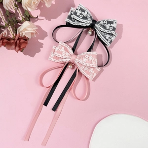 Elegant lace bow hair clips with long ribbon tassels and pearls in black and pink