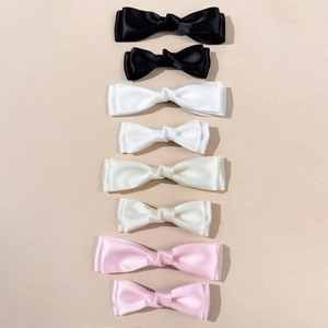 Set of 8 French style cream bows hair clips in satin finish and various sizes