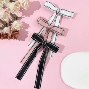 Elegant British style bow hair clip set in black pink and white with striped ribbons