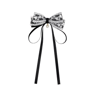 Elegant black and white lace bow hair clip with pearl pendant in vintage French style