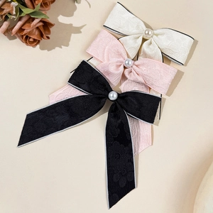 Barrettes à cheveux élégantes avec nœuds et perles en crème, rose et noir pour femmes