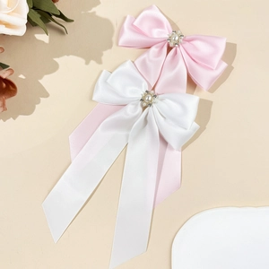 Barrette à cheveux élégante en satin avec perles et strass en rose et blanc chic
