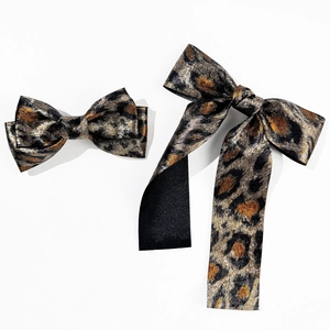Leopard print bow hair clip set with long ribbon in golden brown and black silk fabric