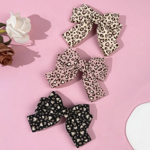 Dreiteiliges Set Leopardenmuster Schleifen-Haarspangen in Beige, Rosa und Schwarz