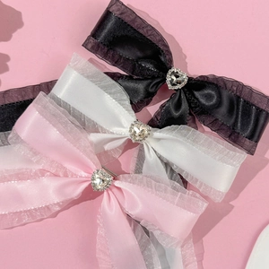 Set of sweet bow hair clips with lace and heart rhinestones in pink, white, and black colors