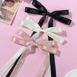 Lot de barrettes à nœuds en dentelle noir blanc et rose pour une coiffure élégante femme