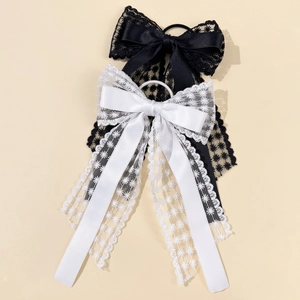 Grands nœuds à cheveux élégants en dentelle noire et blanche avec broderie d'étoiles