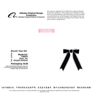 Detail of elegant black fabric bow hair clip with white scalloped lace edges weighing 10g