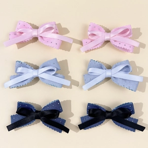 Set of six ballet-style bow hair clips with rhinestones in pink, light blue and navy