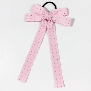 Chouchou nœud rose avec strass, bords ondulés et élastique noir pour cheveux