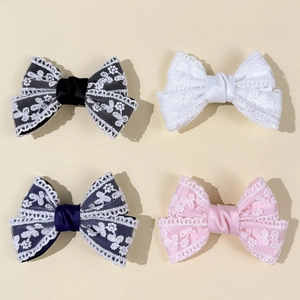 Set of 4 elegant lace bow hair clips in black, white, navy, and pink for women and girls