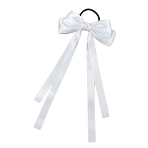 Elegant white satin bow hair tie with long ribbons on a minimalist white background