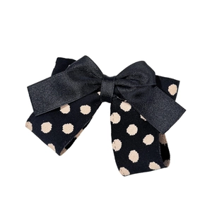 Pince à cheveux à nœud noir à pois avec un design français élégant et vintage
