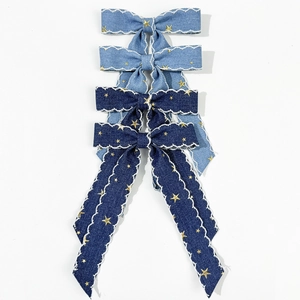 Lot de 4 barrettes nœuds en jean avec broderie étoile dorée et bords ondulés blancs