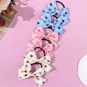 Lot de 6 chouchous à nœuds coeurs en rose bleu et crème pour coiffure fille