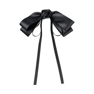 Elegant black satin ribbon hair clip with rose flower and long drapes on white background