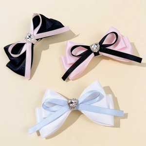 Three-piece set of satin bow hair clips with silver heart rhinestone center ornaments