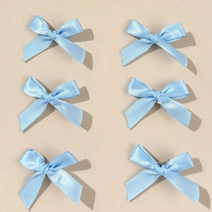 Set of six light blue satin bow hair clips featuring a glossy finish and metal base pins