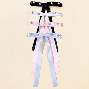Set di fermagli per capelli con fiocchi e stelle in nero bianco rosa e azzurro