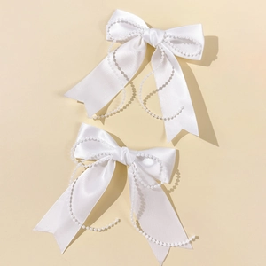 Pair of cream white satin bow hair clips with pearl bead edges for girls sweet hair style